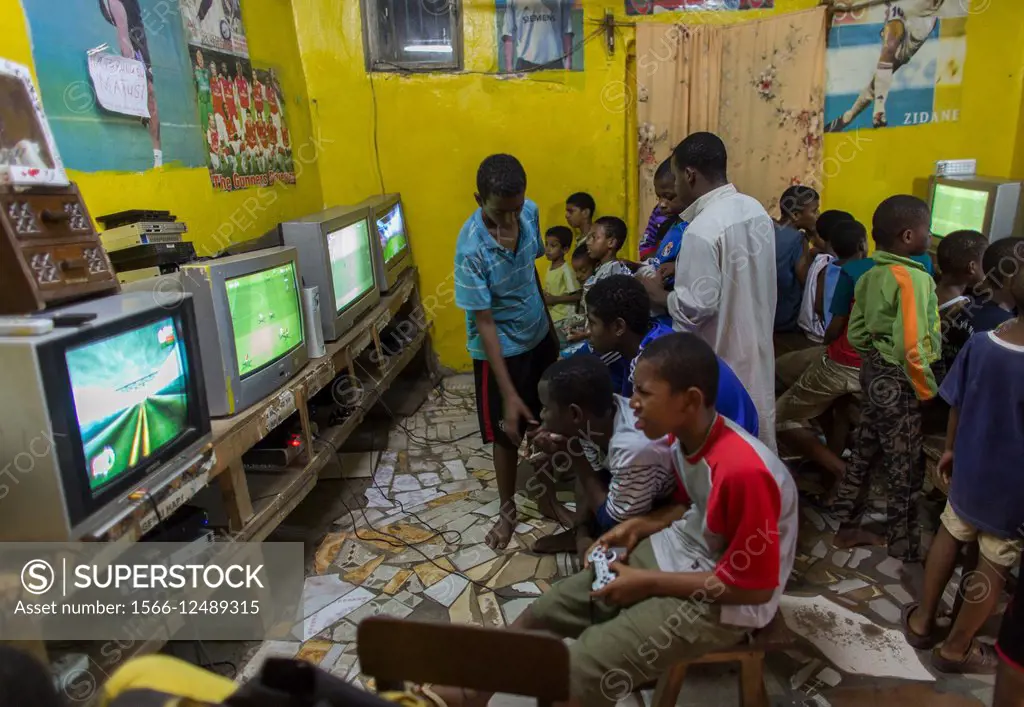 children playing video games in zanzibar.