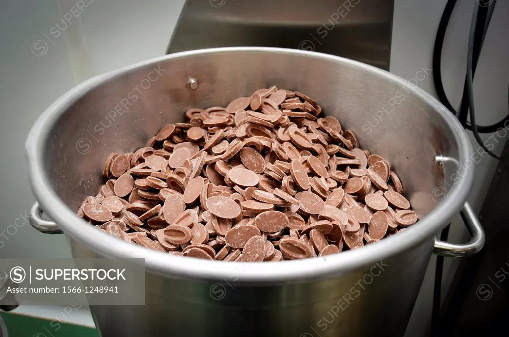 Bars of chocolate in an aluminum pot.