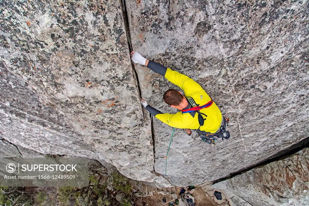 Rock climbing a route called Bloody Fingers which is rated 5,10 and located on Super Hits Wall at the City Of Rocks National Reserve near the town of ...