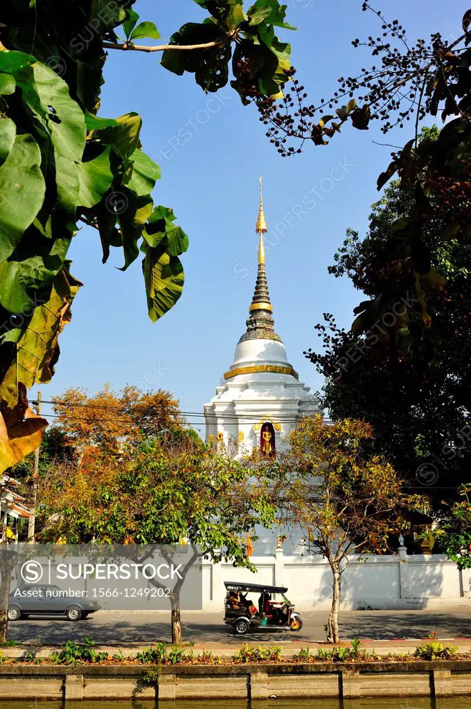 tuk-tuk and Wat Temple Chai Si Phum, Chiang Mai, Thailand