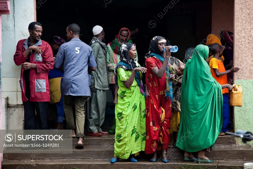 Women wait at a bus station near Harar, Ethiopia