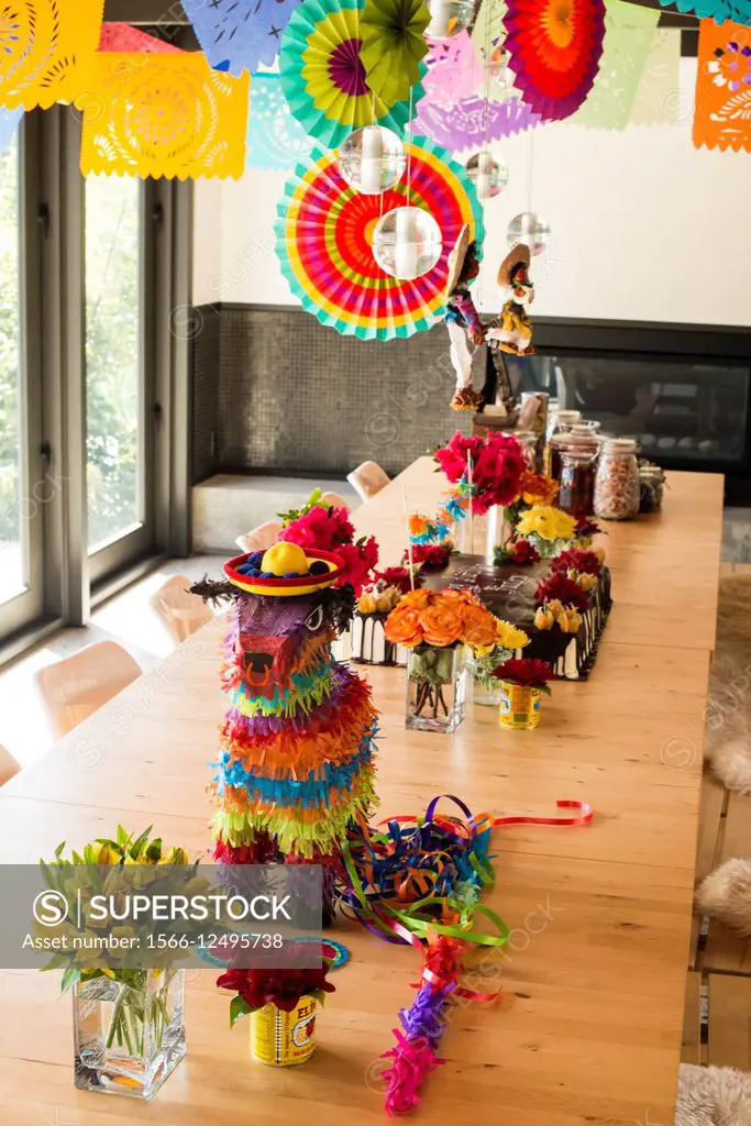 Mexican theme party decorations in a dining room of a house in Vancouver, BC, Canada.