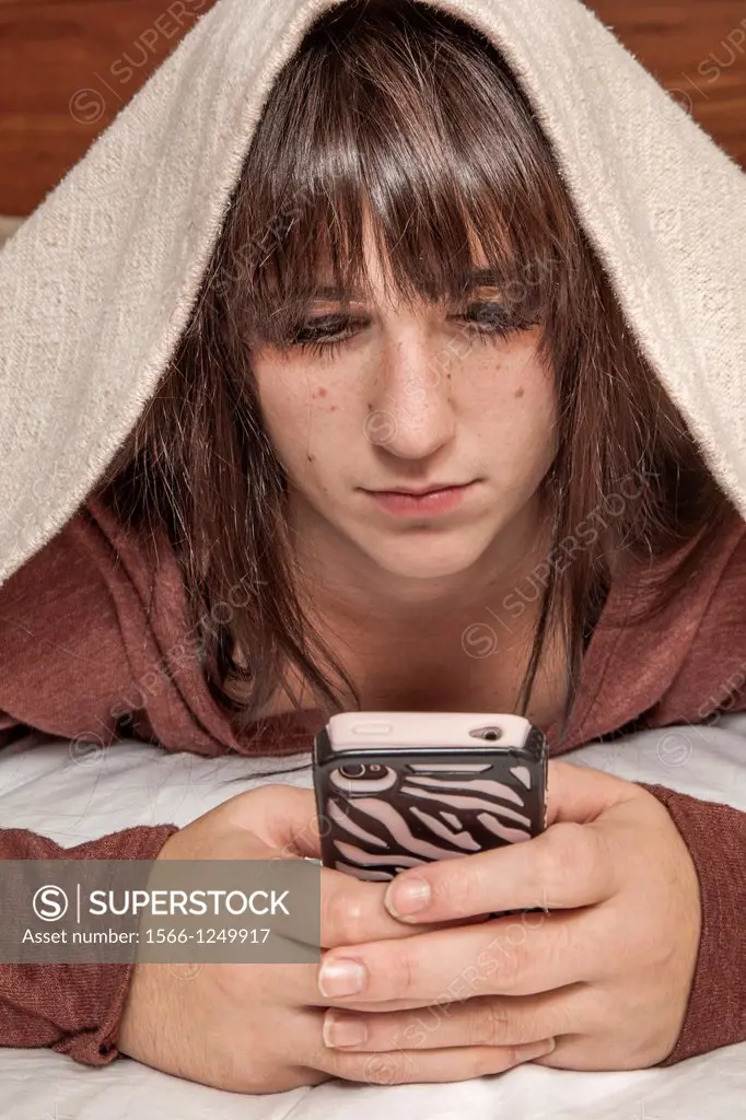 Teen girl with her smart phone