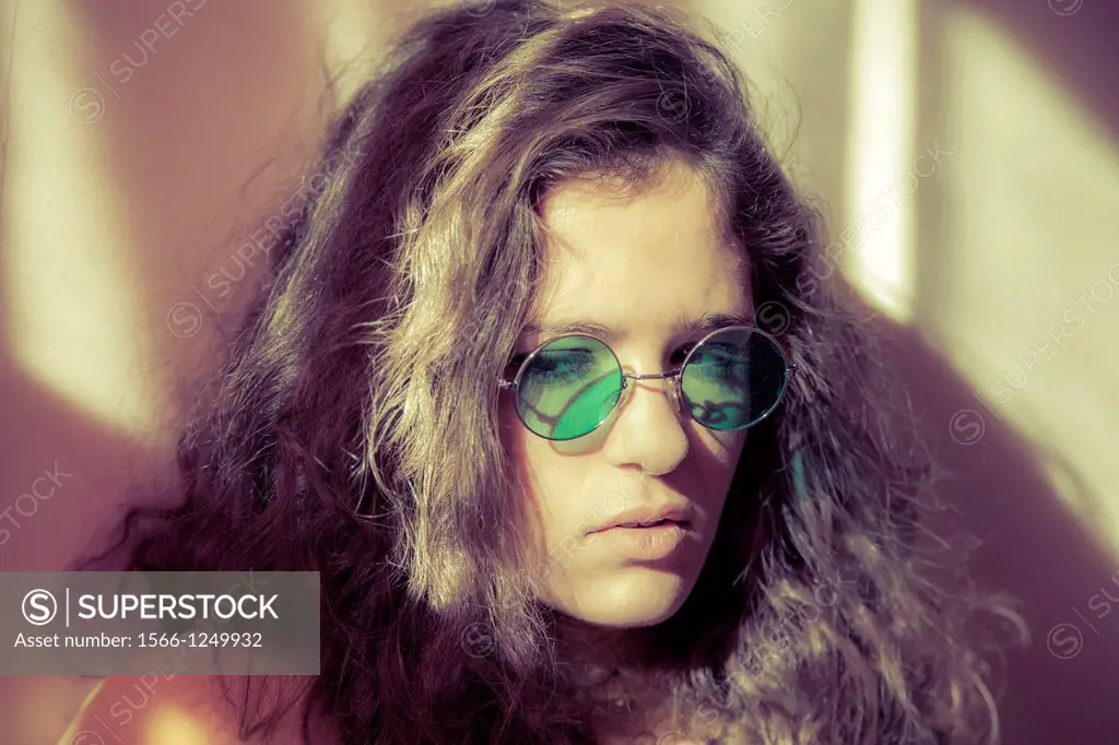 Teen girl wearing sunglasses