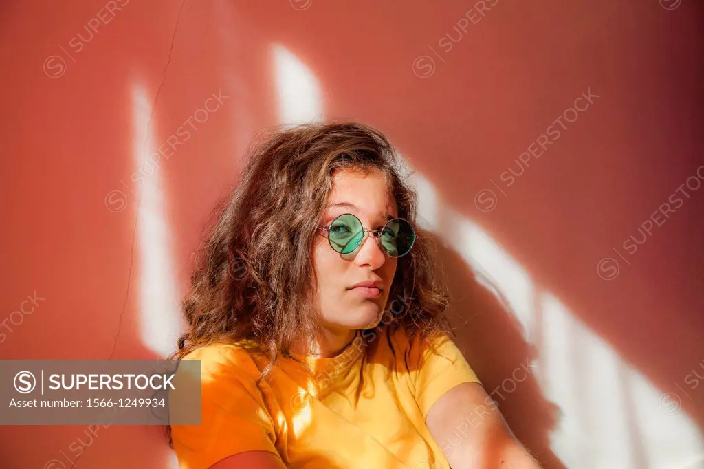 Teen girl wearing sunglasses