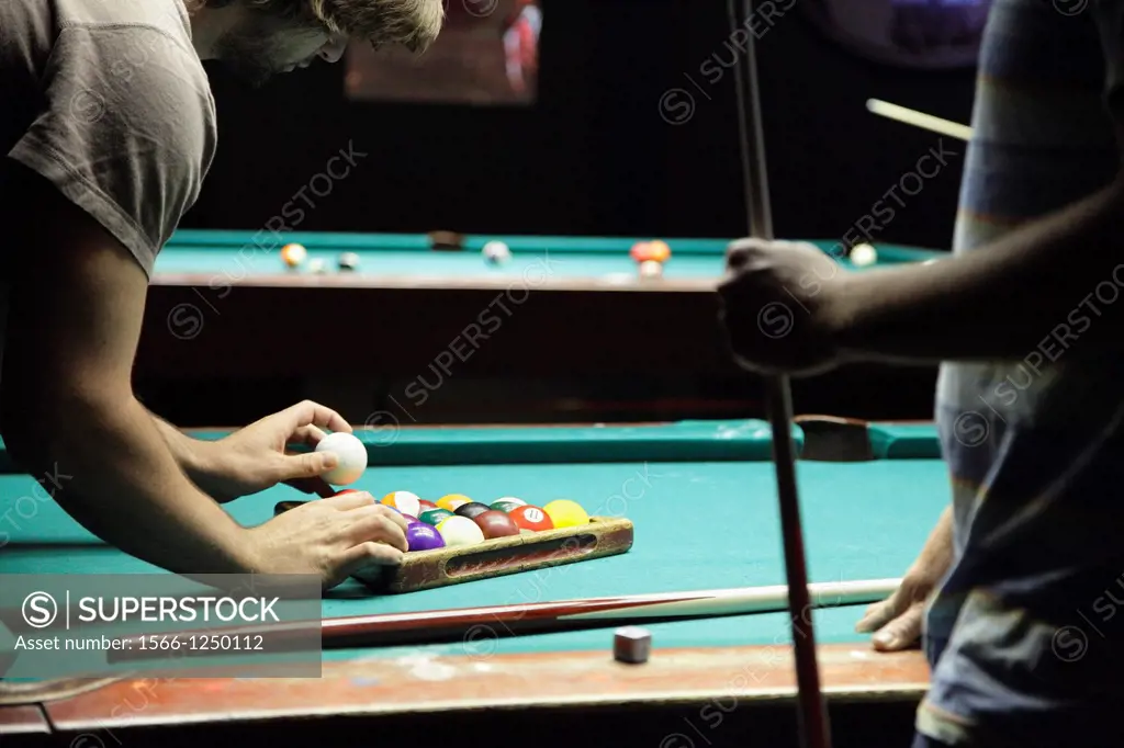 Men playing billiards in a bar, North Carolina, USA