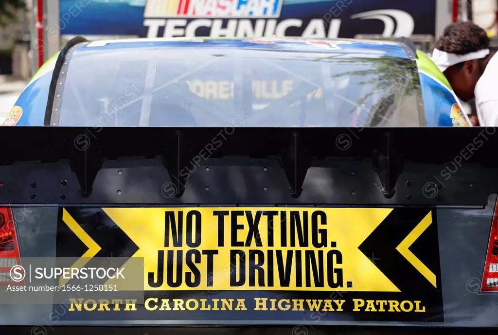 ´No Texting  Just Driving´ safety message on a race car in downtown Raleigh, North Carolina, USA