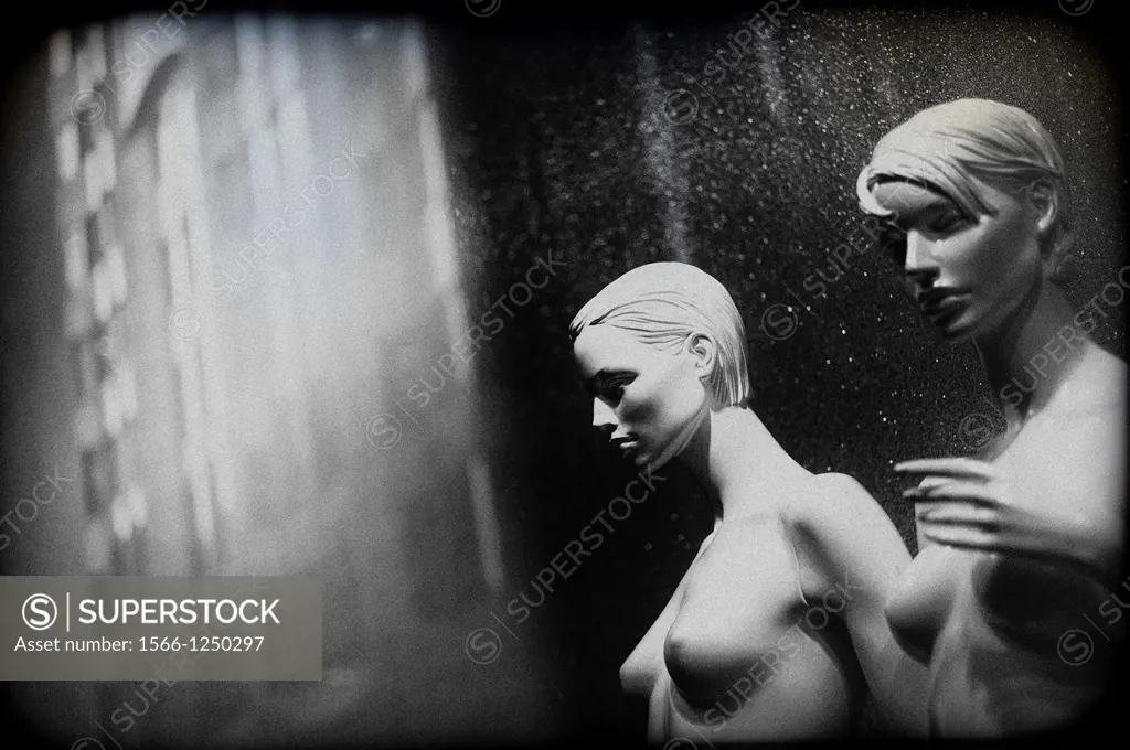 naked female mannequins in a shop window in London, England, UK