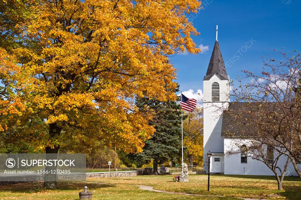 The Holy Cross Catholic Church with fall foliage color at Cross Village, Michigan, USA