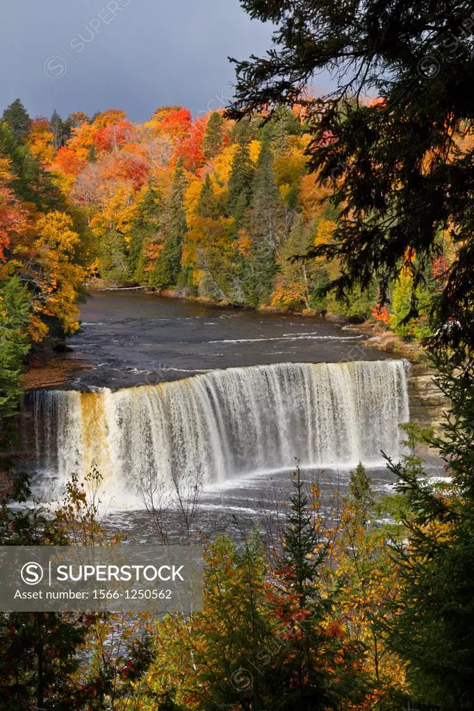 The Upper Tahquamenon Falls with fall foliage color near Newberry, Michigan, USA