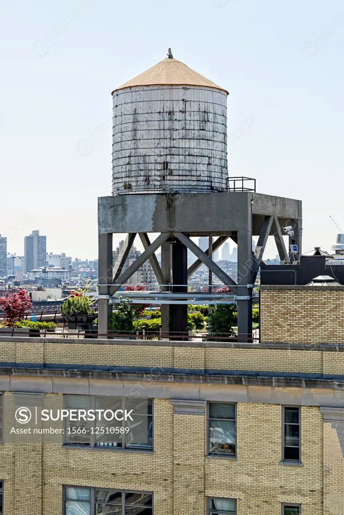Looking at a Water Tower on the roof of a New York City apartment building, USA