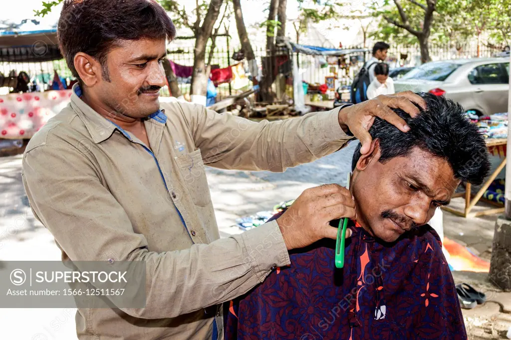 India, Asian, Mumbai, Karmaveer Bhaurao Patil Marg, Mantralaya, Fort Mumbai, sidewalk barber, shaving customer, man.