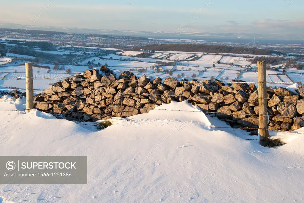 Stone wall and snowdrift, England, United Kingdom, Europe