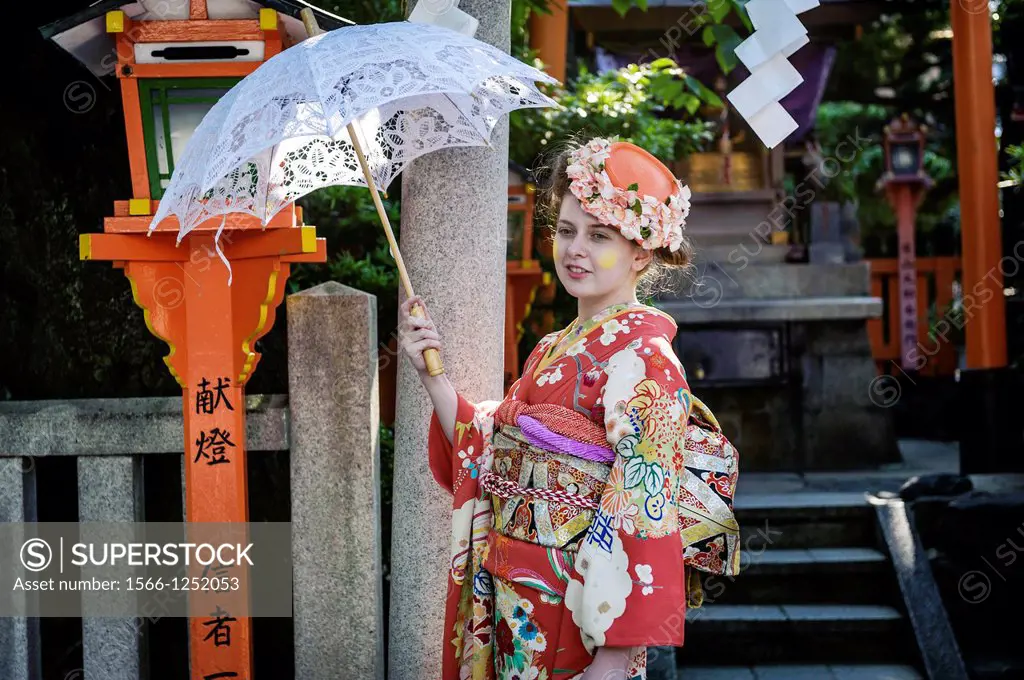 Tourist dressed with kimono on the streets of Kyoto, Japan, Asia