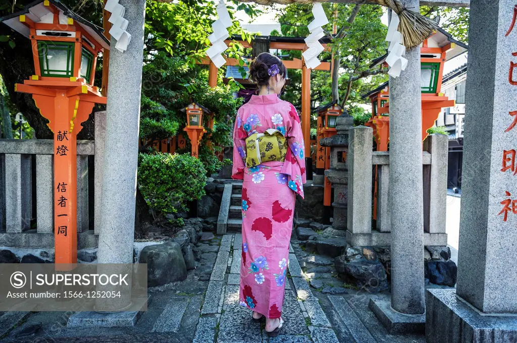 Tourist dressed with kimono on the streets of Kyoto, Japan, Asia