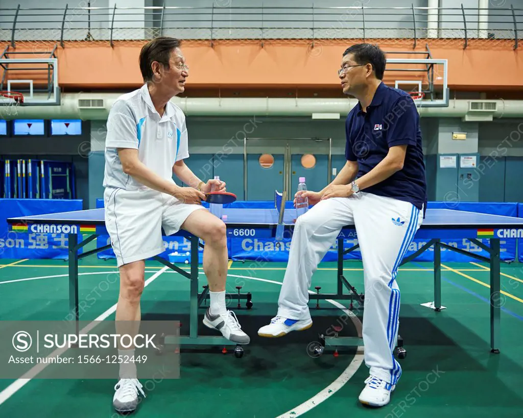 Jonney Shih, Chairman of ASUS plays a ping pong with Jerry Shen, CEO of ASUS  For them Ping Pong is a metaphor for business and ideas