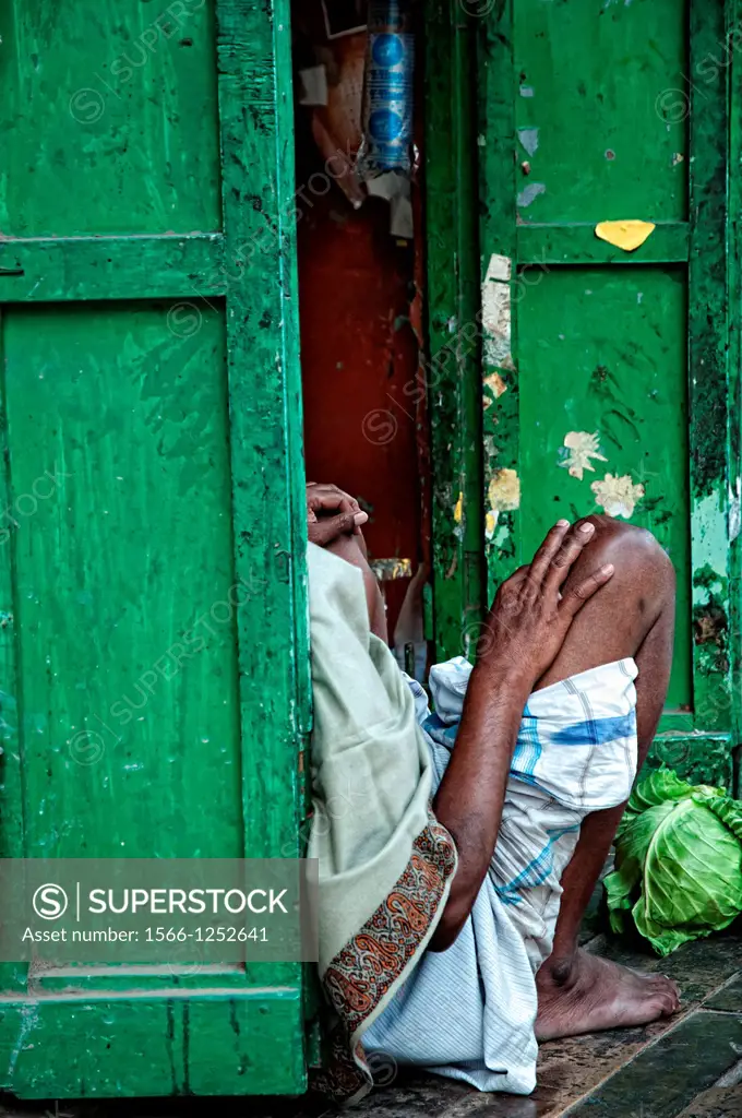 Man at his food stall Calcutta, Kolkata, West Bengal, India
