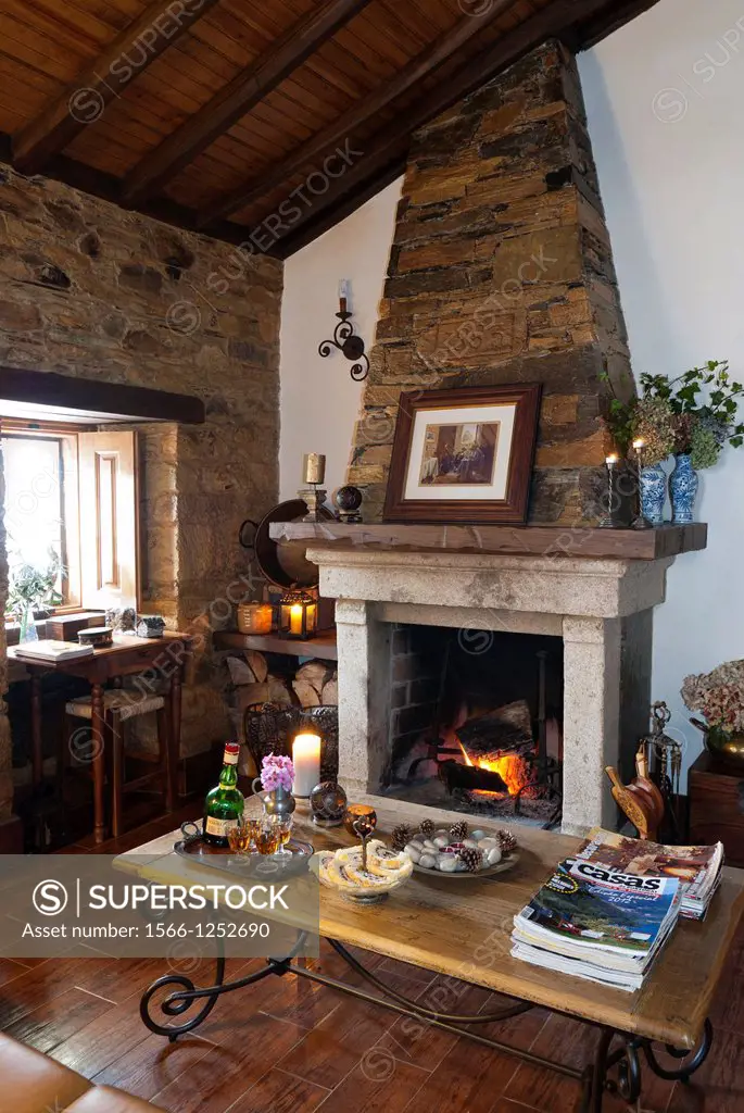 Living-room with fireplace set, at a rural house tourism, Góis-Portugal