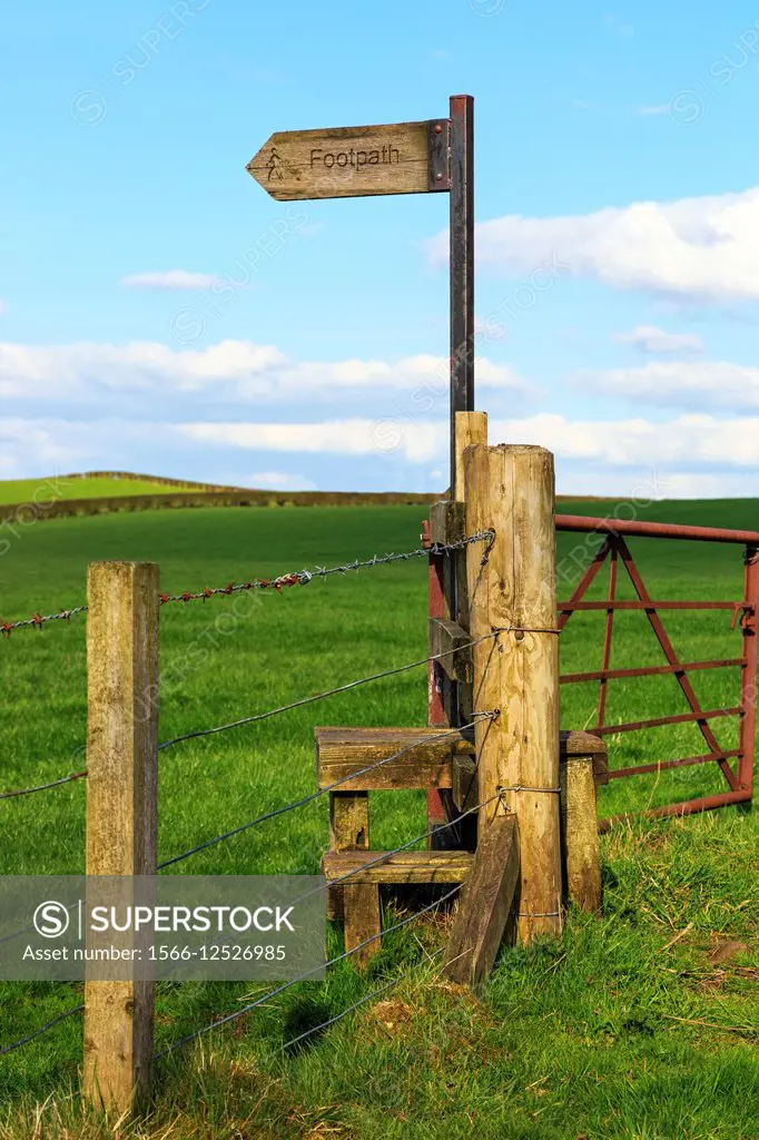 Footpath and stile crossing in the Scottish countryside near Kilmarnock, Ayrshire.
