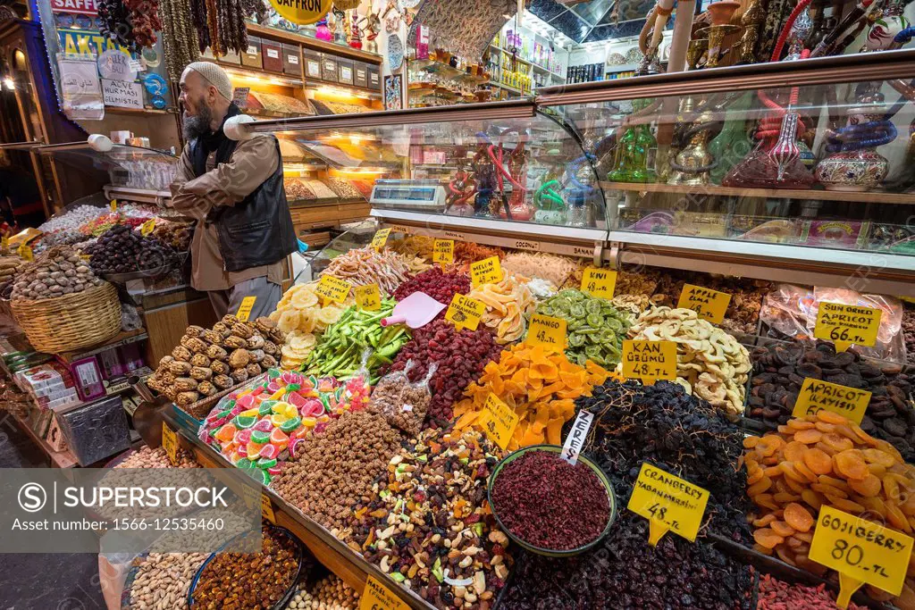 Nuts, dried fruits and spices on a stall at the spice bazaar, Eminonu, Istanbul, Turkey.