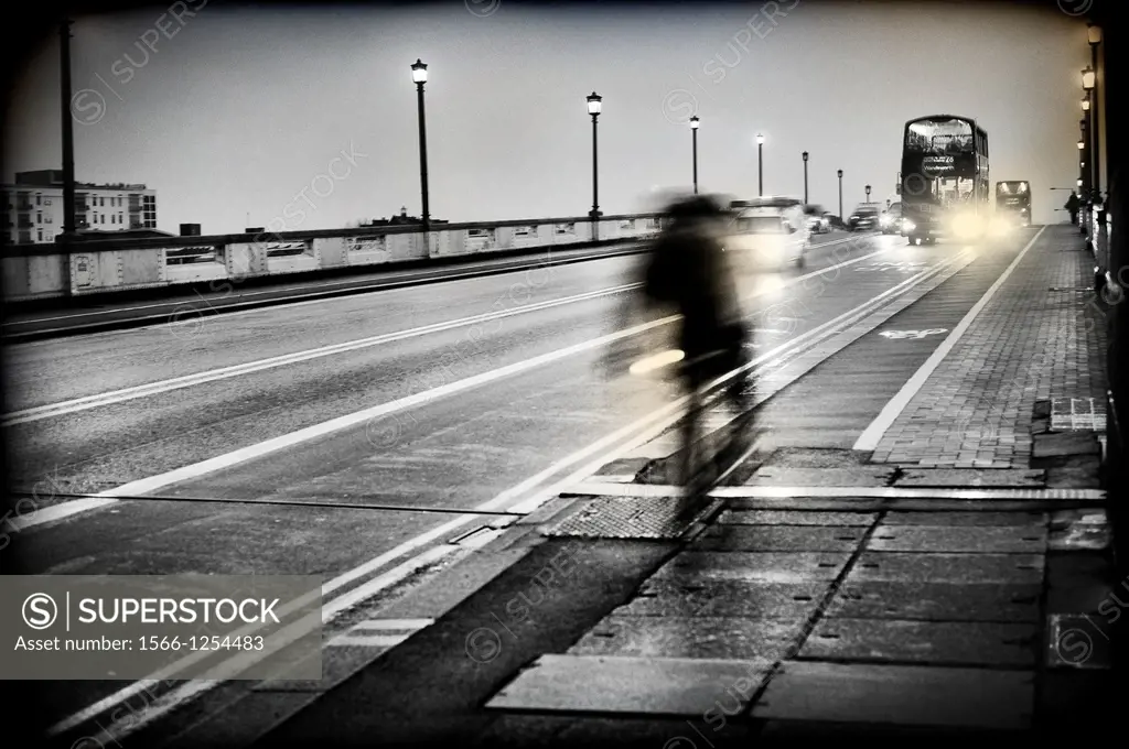 Blurred motion, Double-decker bus and bicycle in movement, Clapham junction, England, London, UK