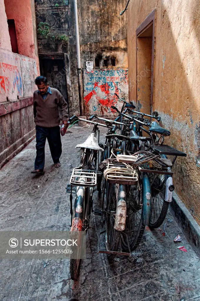 Bicycles parked in an alleyway near Kalighat, Calcutta, West Bengal, India