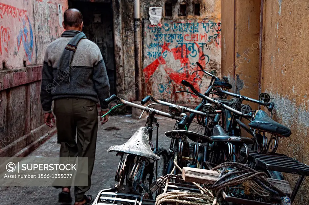 Bicycles parked in an alleyway near Kalighat, Calcutta, West Bengal, India