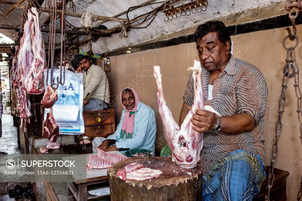 India, Asian, Mumbai, Lower Parel, Sunday Market, meat vendor, shopping, selling, sale, butcher, working, man.