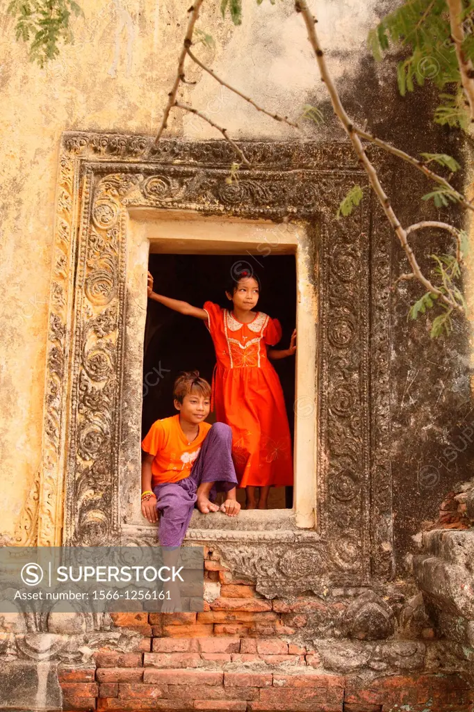 Young Boy and girl Playing near Temple in Bagan, Myanmar, Burma