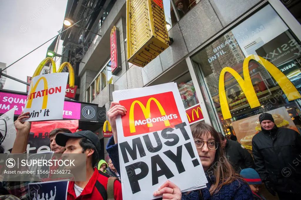 Student guestworkers and their supporters protest in front of a McDonald´s restaurant in Times Square in New York against alleged exploitation of the ...