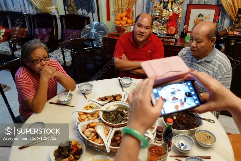 A typical Chinese New Year Eve family gathering dinner in Kuching, Sarawak, Malaysia.