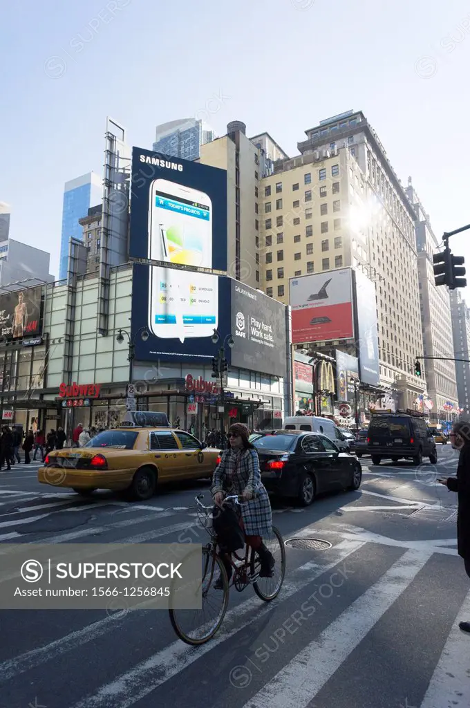 Advertising for the Samsung Note II mobile phone above in the Herald Square neighborhood of New York