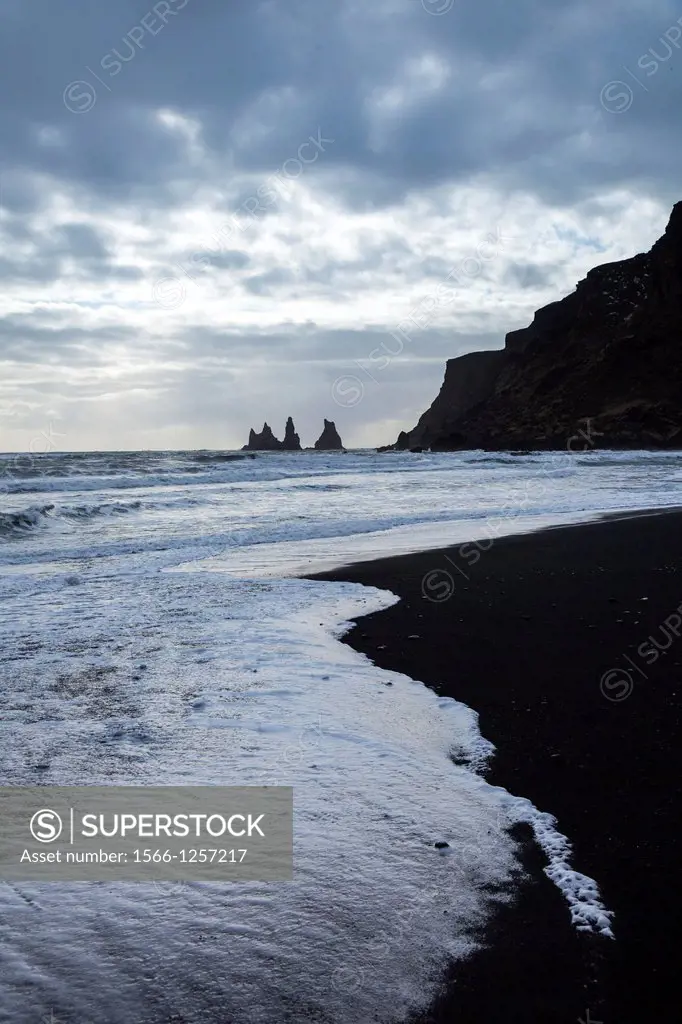 Rock formations and sea surf at Dyrholaey, ISouthern Iceland, Iceland, Europe.