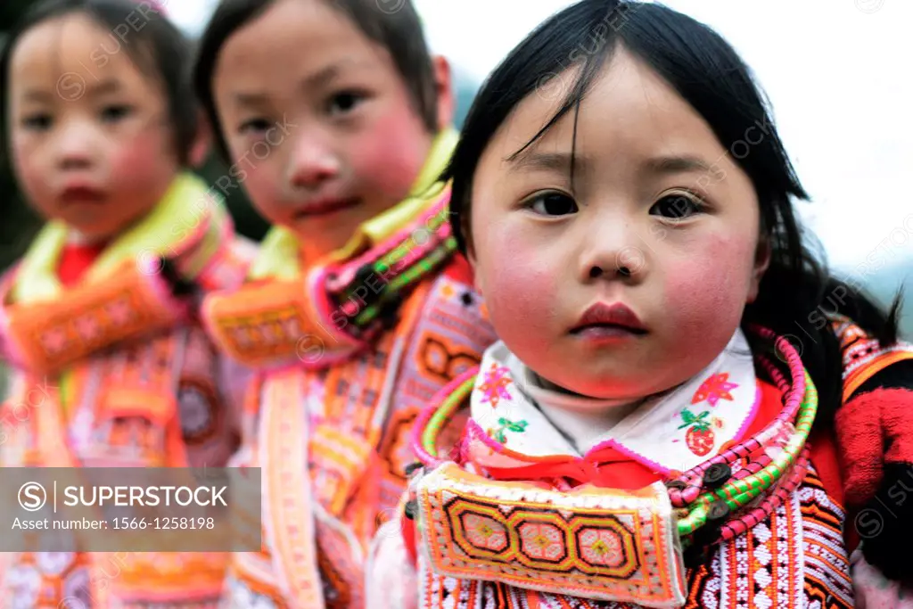 Long Horn Miao girls dancing in the annual Tiao Hua festival in western Guizhou, China