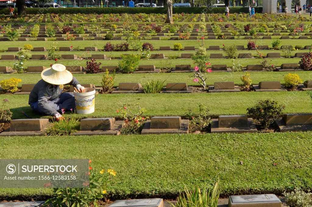 Gravestones at the Kanchanaburi War Cemetery remembering Commonwealth prisoners of war, Kanchanaburi, Thailand.