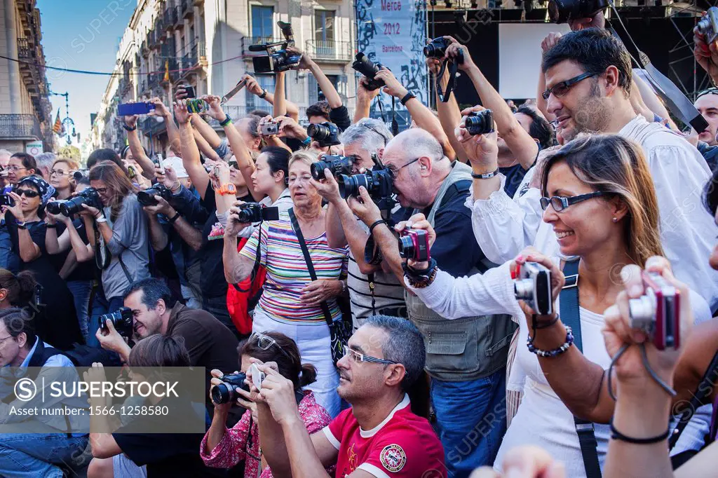 people taking pictures of `Trabucaires´ during La Merce Festival  Plaça de Sant Jaume  Barcelona  Catalonia  Spain