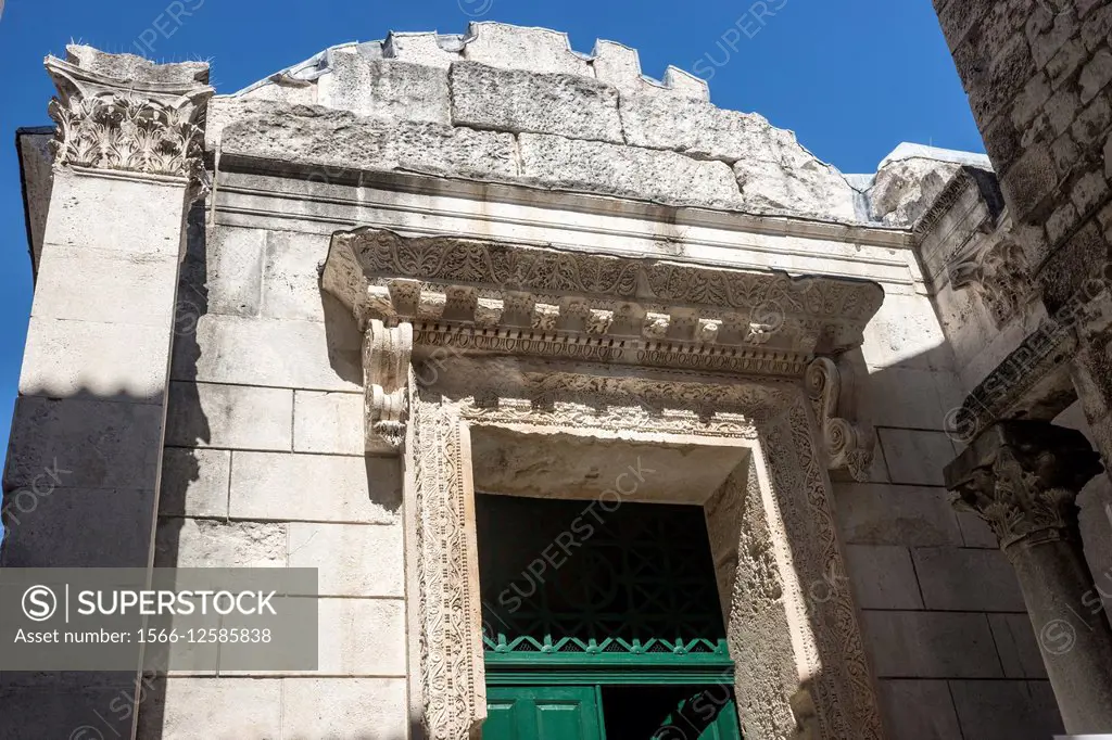 Facade, The Baptistery, formerly the Roman Temple of Jupiter, with its famous 11th century baptismal font and sculpture of St John the Baptist by Ivan...
