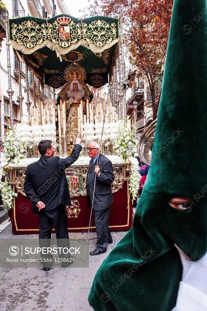 penitents in procession, sisterhood of Jesus del Gran Poder y virgen de la Macarena, Statue usually in the San Agustin church, Good Friday, Easter wee...