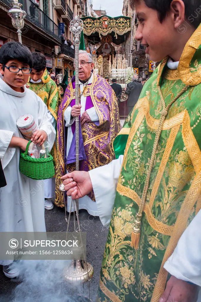 priest and altar servers in procession, sisterhood of Jesus del Gran Poder y virgen de la Macarena, Good Friday, Easter week, carrer Hospital, Barcelo...