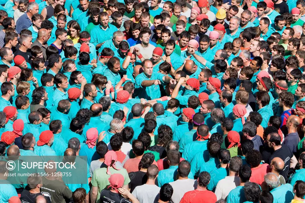 In the center man commanding the group  ´Castellers´ building human tower, a Catalan tradition  Vilafranca del Penedès  Barcelona province, Spain