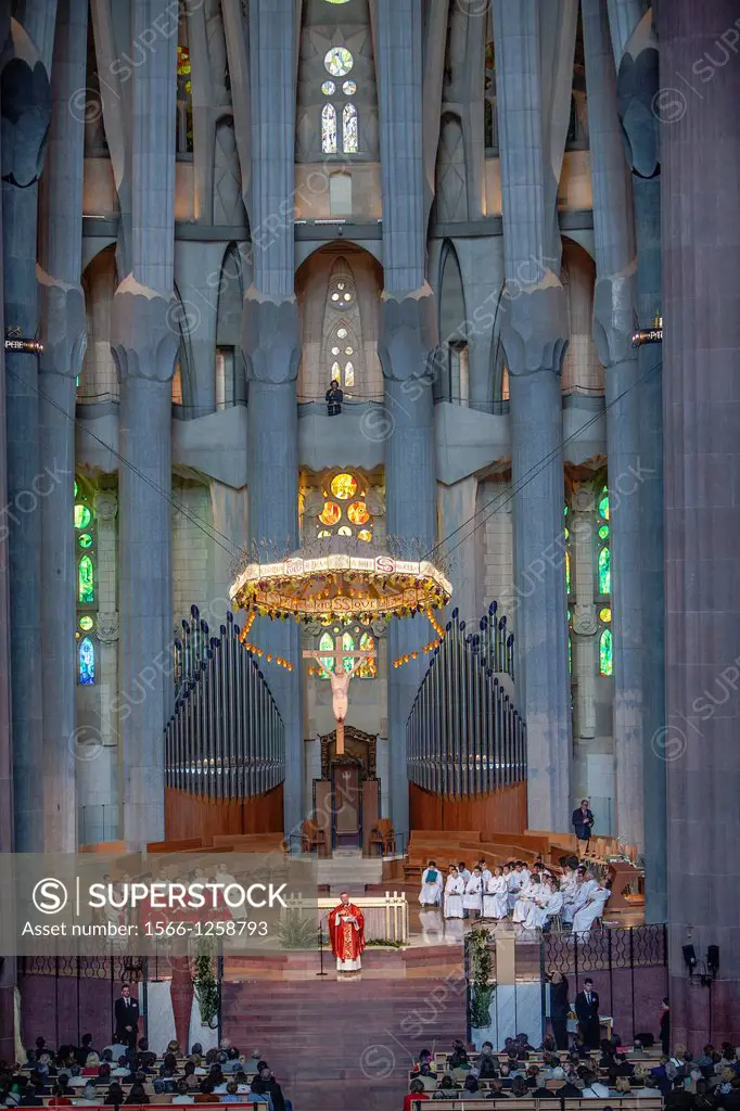 Mass,Interior of Basilica Sagrada Familia,altar and apse, Barcelona, Catalonia, Spain
