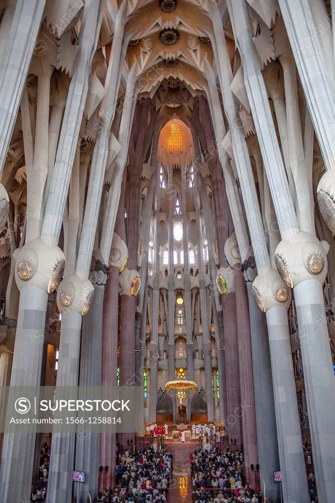 Mass,Interior of Basilica Sagrada Familia,nave, Barcelona, Catalonia, Spain