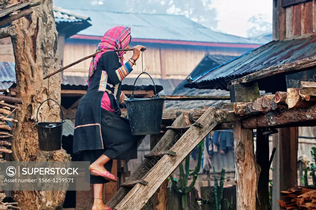 Akha woman carrying water, Phongsaly, Laos