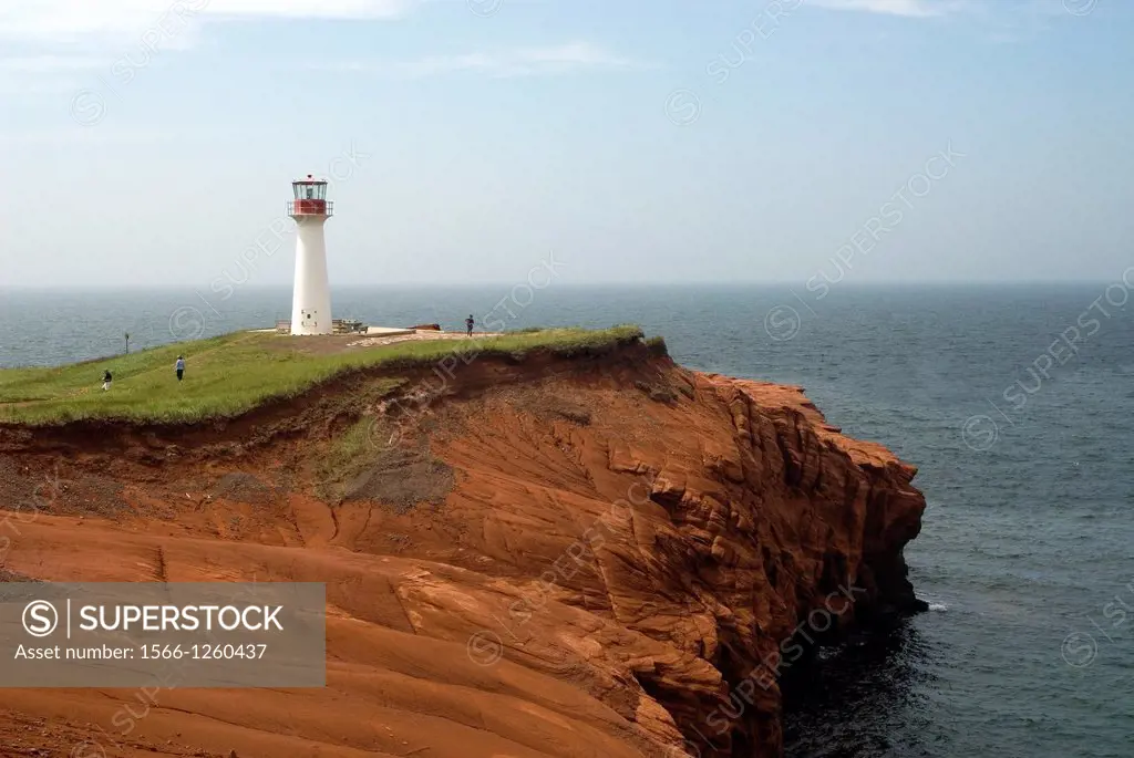 lighthouse on the sandstone cliffs of Etang-du-Nord cape, Cap aux Meules island, Magdalen Islands, Gulf of Saint Lawrence, Quebec province, Canada, No...