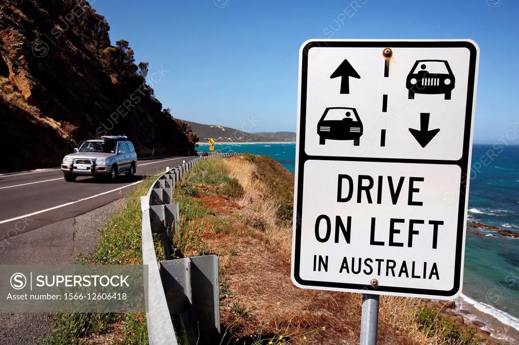 Drive left in Australia; warning sign for foreign tourists driving along the Great Ocean Road. Victoria, Australia.