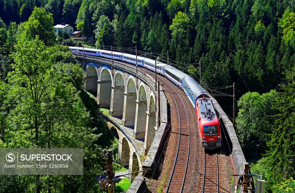 Passenger train on the Kalte Rinne Viaduct, UNESCO World Heritage Site, built 1848-1854