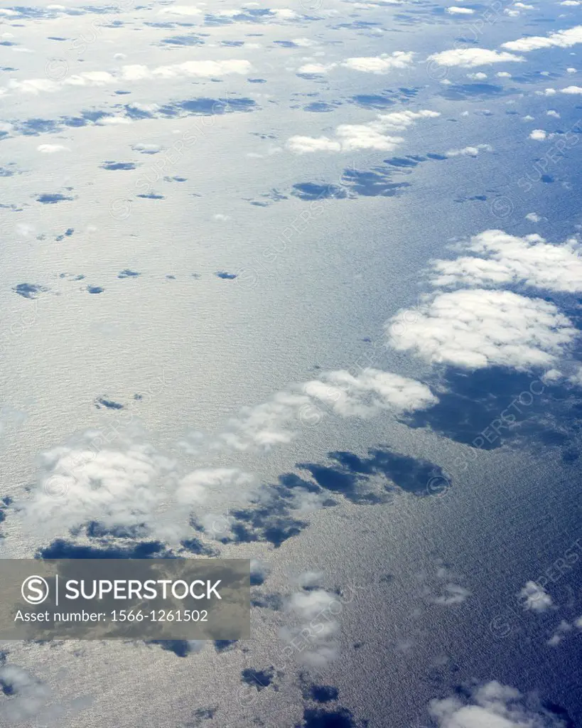 Aerial image of fluffy clouds over the ocean off the coast of Okinawa, Japan