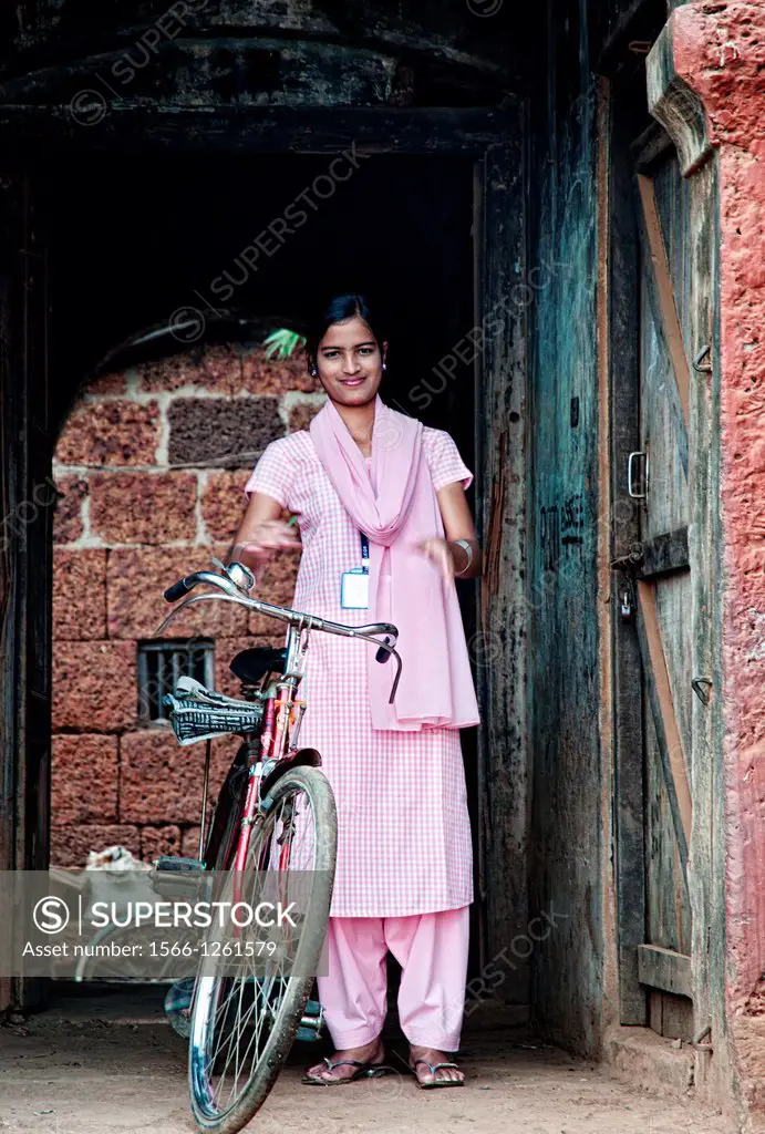 Girl with bicycle  Bhubaneswar, Orissa, India