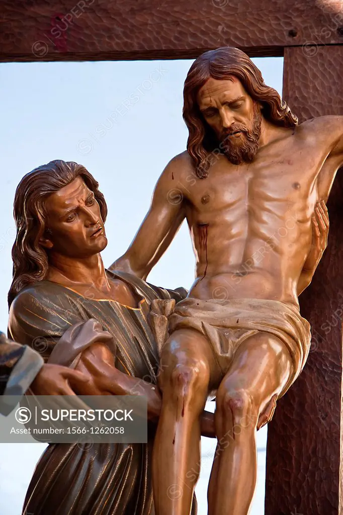 Wood carving of cedar of Spanish sculptor Victor de los Rios, represents the descent from the cross when Jesus was crucified, holy week in Spain, popu...