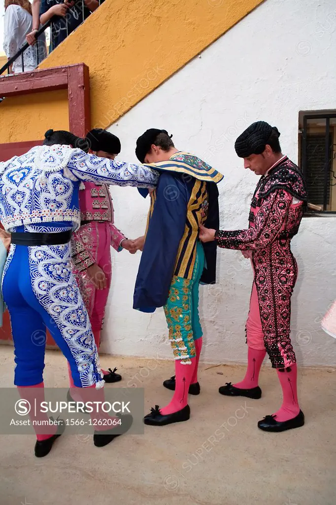 Bullfighters getting dressed for the paseillo or initial parade Taken at Linares bullring before a bullfight, Linares, Spain, 17 octuber 2008